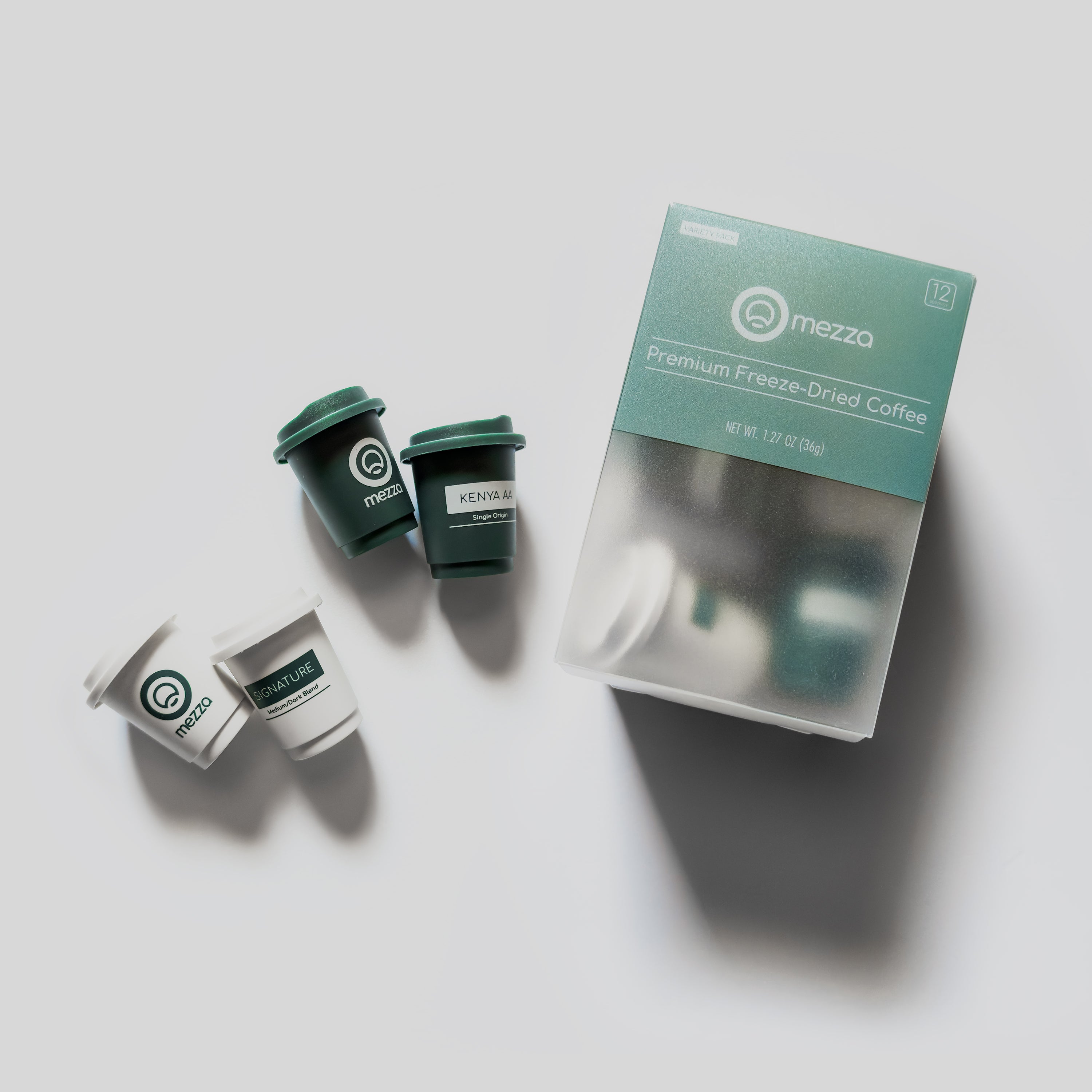 Mezza coffee products laid out on a flat surface