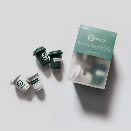 Mezza coffee products laid out on a flat surface
